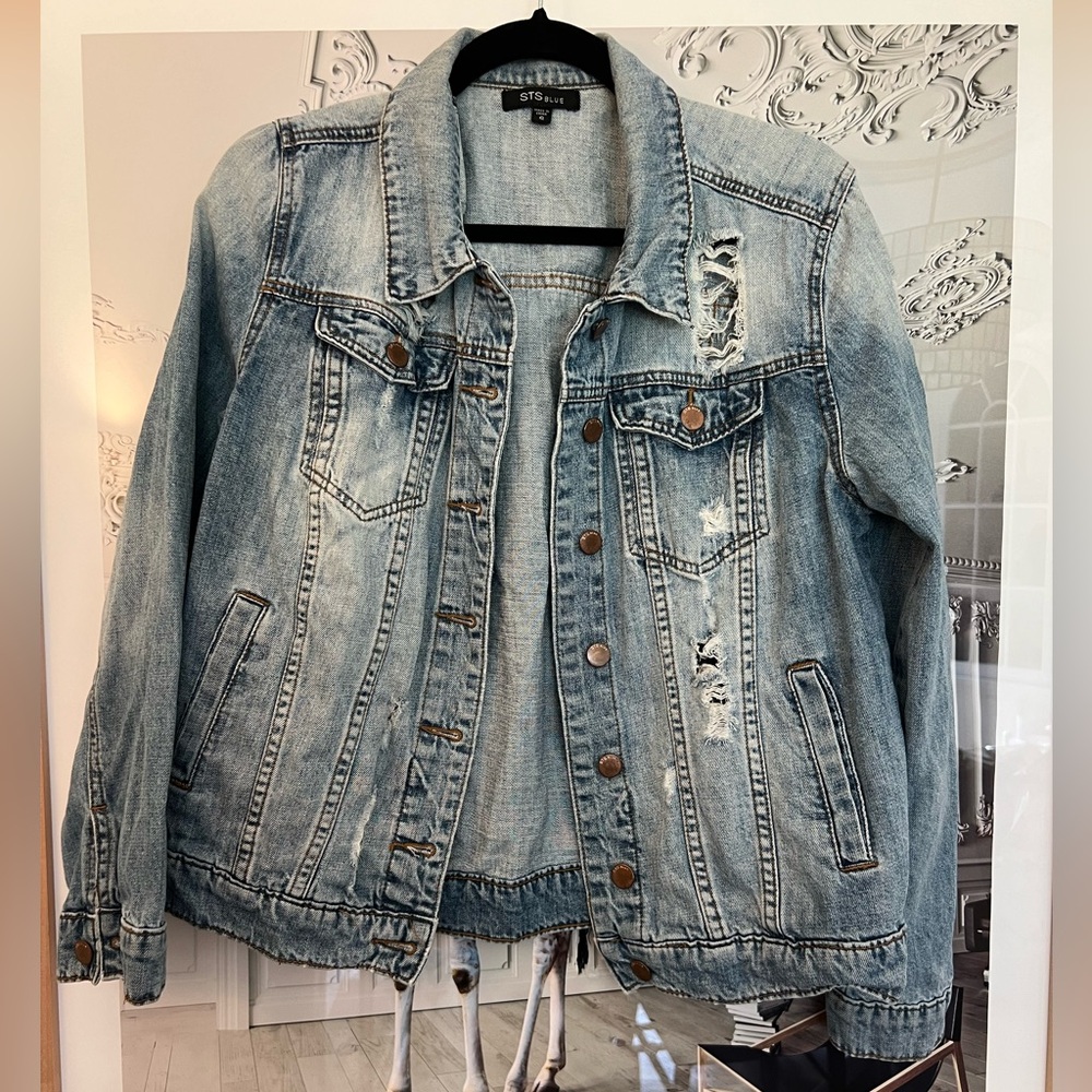 STS Blue size S.  Soft, worn feel.